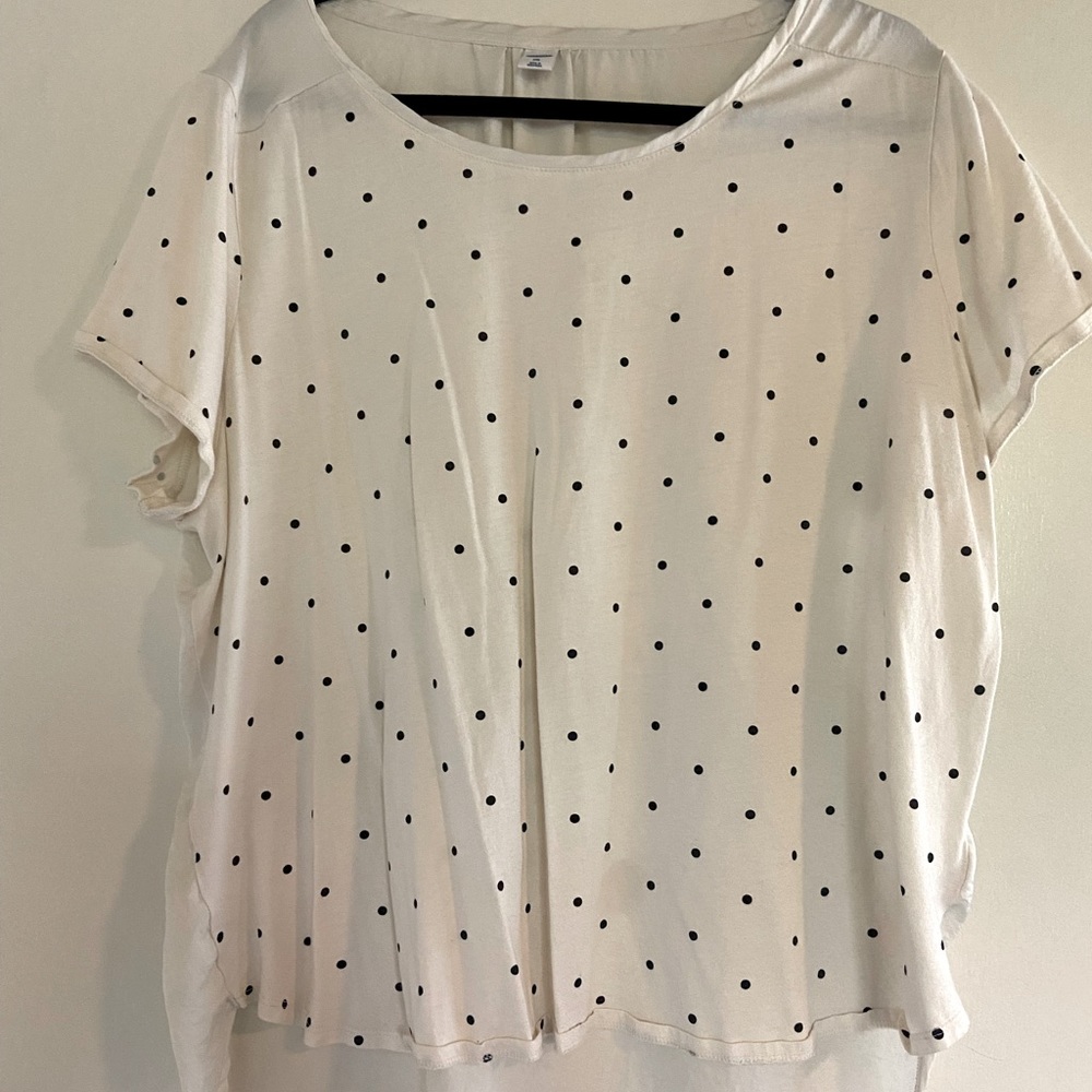 Asymmetric hem polka dot blouse with silky back